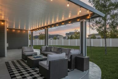grey house with grey and white patio cover with white trim in Boise, Idaho.