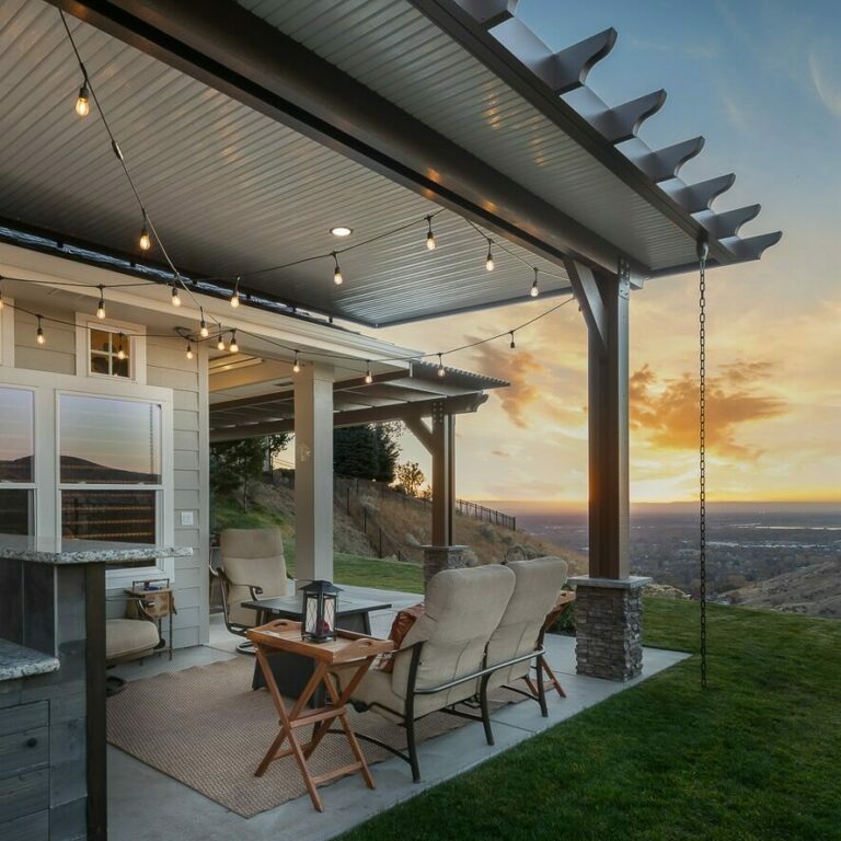 Patio cover on tan house in Idaho