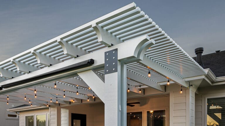 picture of white pergola with string lights